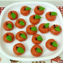 A picture of Coconut orange ladoo.