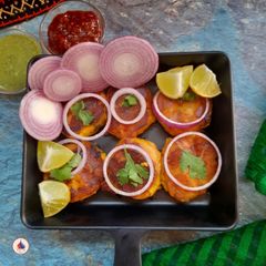 A picture of Tandoori Momos - smoky, Spicy, Street-Style Indo Chinese Delight.