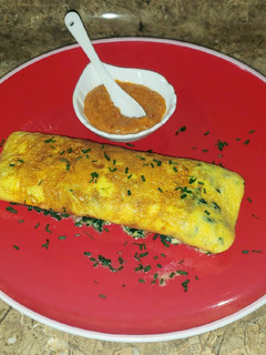 Una foto de Omelette de espinacas y queso azul