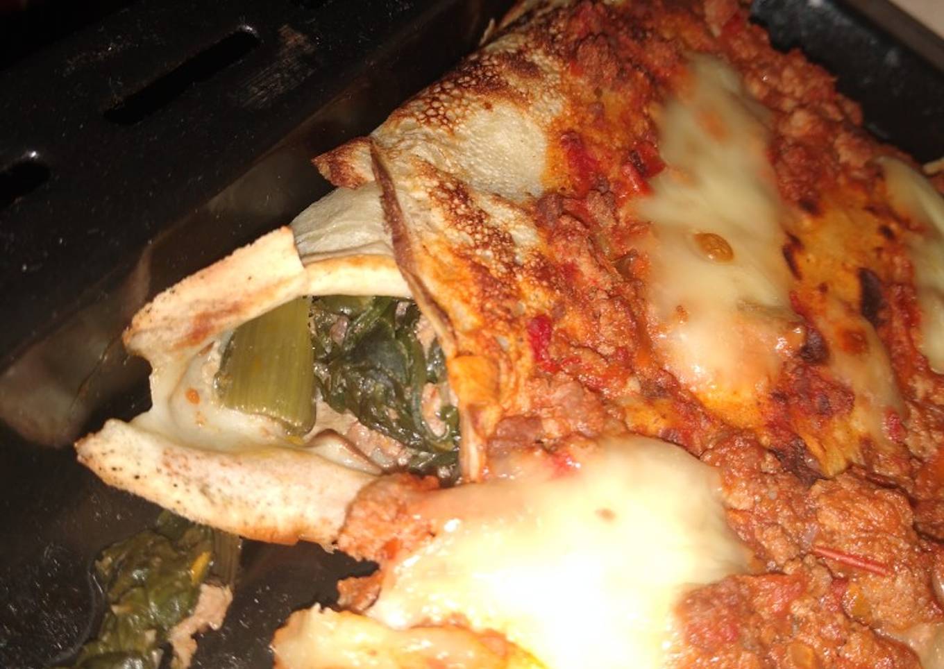 Canelones de acelga con bolognesa