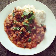 A picture of Spicy Mutton Stew & Coconut Rice.
