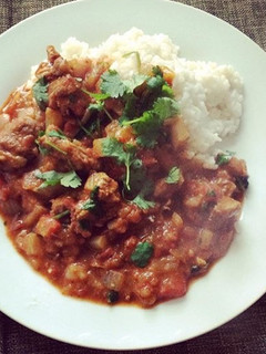 A picture of Spicy Mutton Stew & Coconut Rice.
