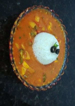 A picture of Stewed vegetable curry with rice.