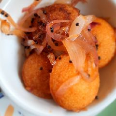 Rava appe with roasted onion A picture of Rava appe with roasted onion.