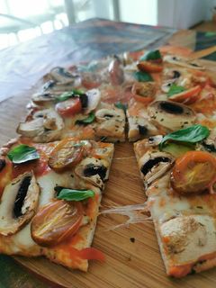 Una foto de Pizza de pollo