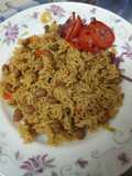 Mseto served with kachumbari ; mix of beans and rice