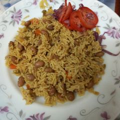 Mseto served with kachumbari ; mix of beans and rice A picture of Mseto served with kachumbari ; mix of beans and rice.