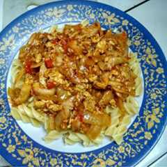 A picture of Fusilli with mushrooms.