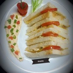 A picture of Cauliflower Rice and potato Fritter Sandwiches.