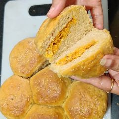 A picture of Corn paneer stuffed pav.