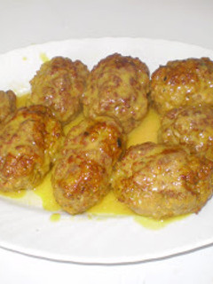 Una foto de Rollitos de carne picada en salsa