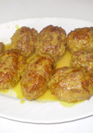 Una foto de Rollitos de carne picada en salsa