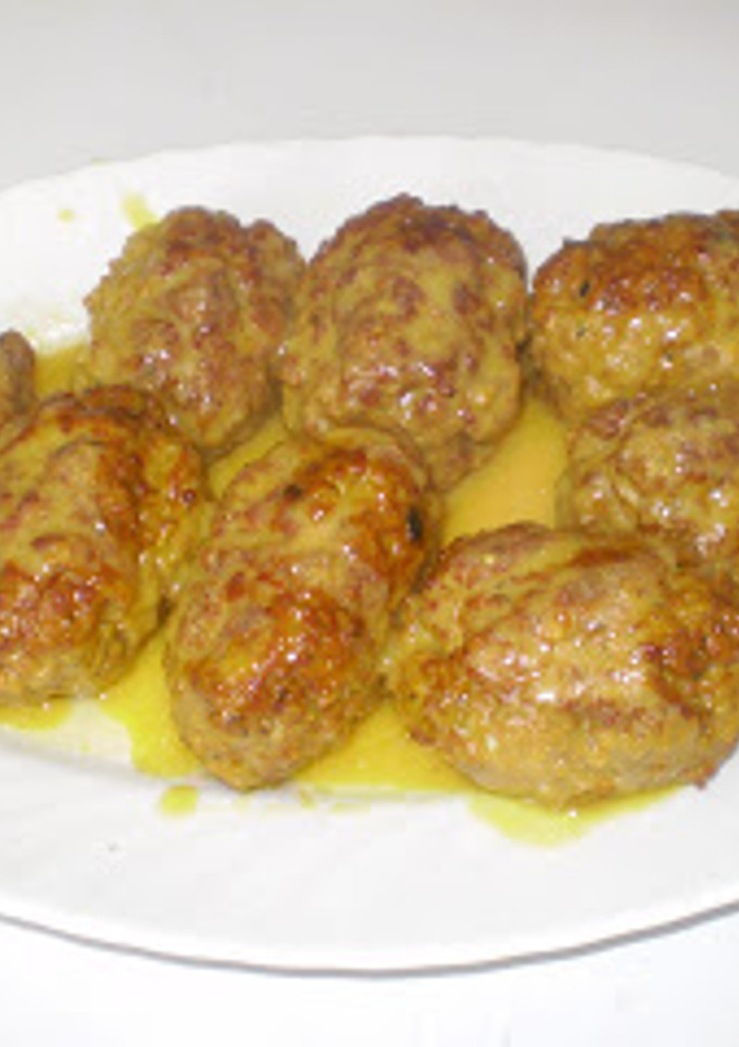 Una foto de Rollitos de carne picada en salsa