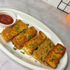A picture of Chicken breadsticks.