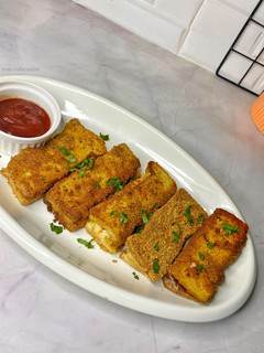 A picture of Chicken breadsticks.