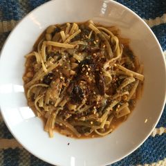 A picture of Linguinne Pasta, Progresso Vegetable Classic Soup and Leftover Dandelion Greens.