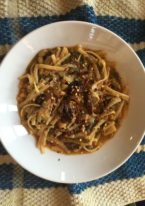 A picture of Linguinne Pasta, Progresso Vegetable Classic Soup and Leftover Dandelion Greens.