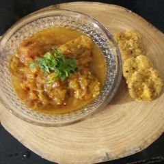 A picture of Sindhi style Besan ki tikki in spicy gravy.