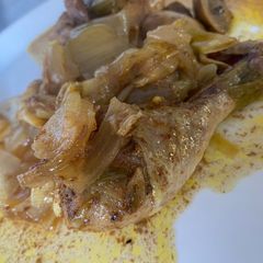 A picture of Coconut butter chicken with leaks.