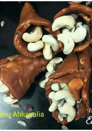 A picture of Jaggery dryfruits cone.