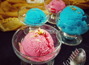 A picture of Ice cream with leftover whipped cream of cake.