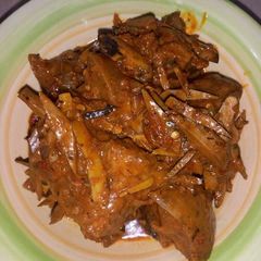 A picture of Ugba with pomo.