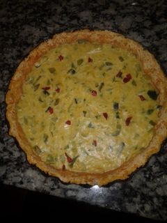 Una foto de Tarta de zapallito con masa de zanahoria😋