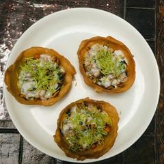 A picture of Potato chat in homemade katori.