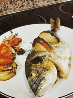Una foto de Dorada al Horno