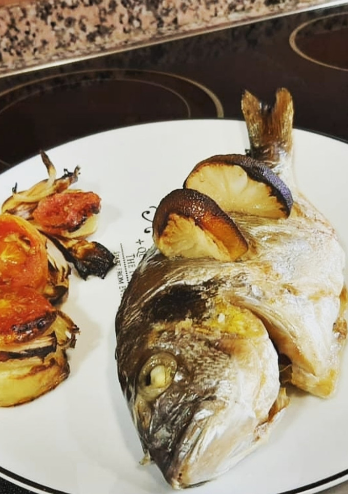 Una foto de Dorada al Horno