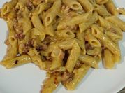Una foto de macarrones con nata y queso