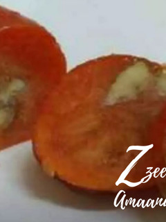 A picture of Frozen Persimmons with stuffed Walnuts.