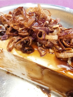 A picture of Steamed Tofu with Fried Shallots and Oyster Sauce.