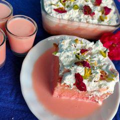 A picture of Rose flavoured Trés lechés cake (eggless).