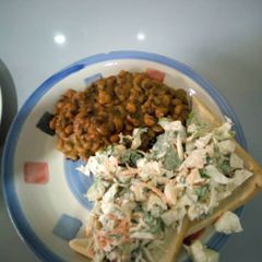 A picture of Beans bread and salad.