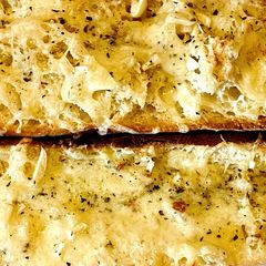 A picture of Cheesy garlic bread.