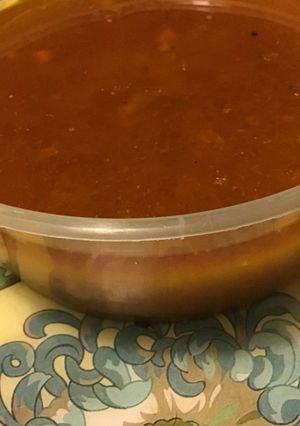 Une photo de Bouillon maison aux tomates du jardin oignons et épices cajun