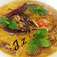 Moong Masoor Daal (red and yellow lentils) A picture of Moong Masoor Daal (red and yellow lentils).