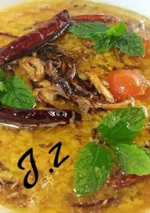 A picture of Moong Masoor Daal (red and yellow lentils).