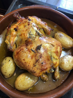 Una foto de Pollo al horno con romero