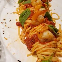 A picture of Shrimp Fra Diavolo over Linguine.