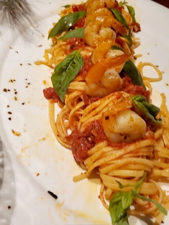 A picture of Shrimp Fra Diavolo over Linguine.