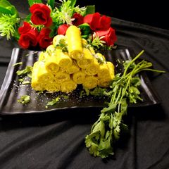 A picture of Cheese khandvi.