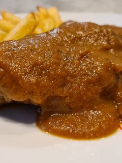 Una foto de Carrilleras en salsa de calabaza y setas