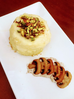 Una foto de Coulant de puré de patata con corazón de crema de champiñones y queso