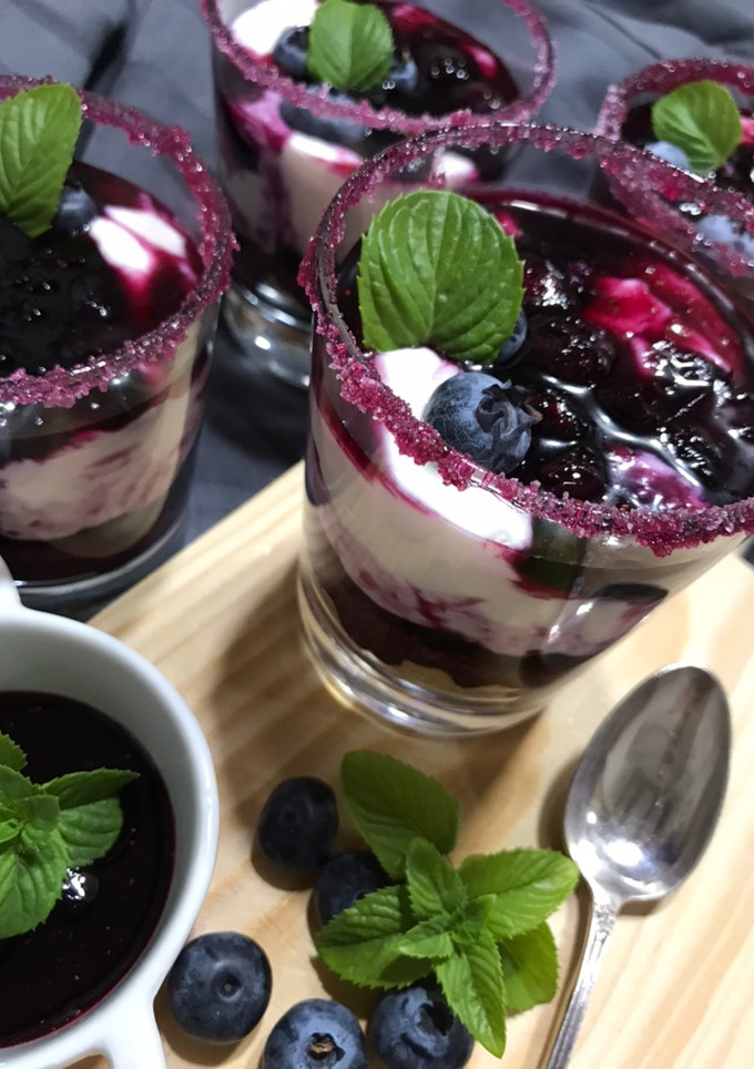 Una foto de 🍃 Cheesecake con coulis de arándanos🍃