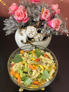 A picture of Veggie Pesto Pasta Cold Salad.