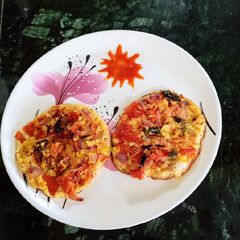 Tomato Onion Rice Chilla A picture of Tomato Onion Rice Chilla.