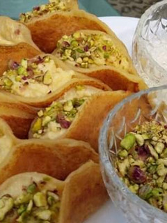 A picture of Qatayef (middle Eastern dessert).