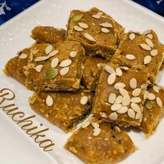 A picture of Masala Gud with seeds.